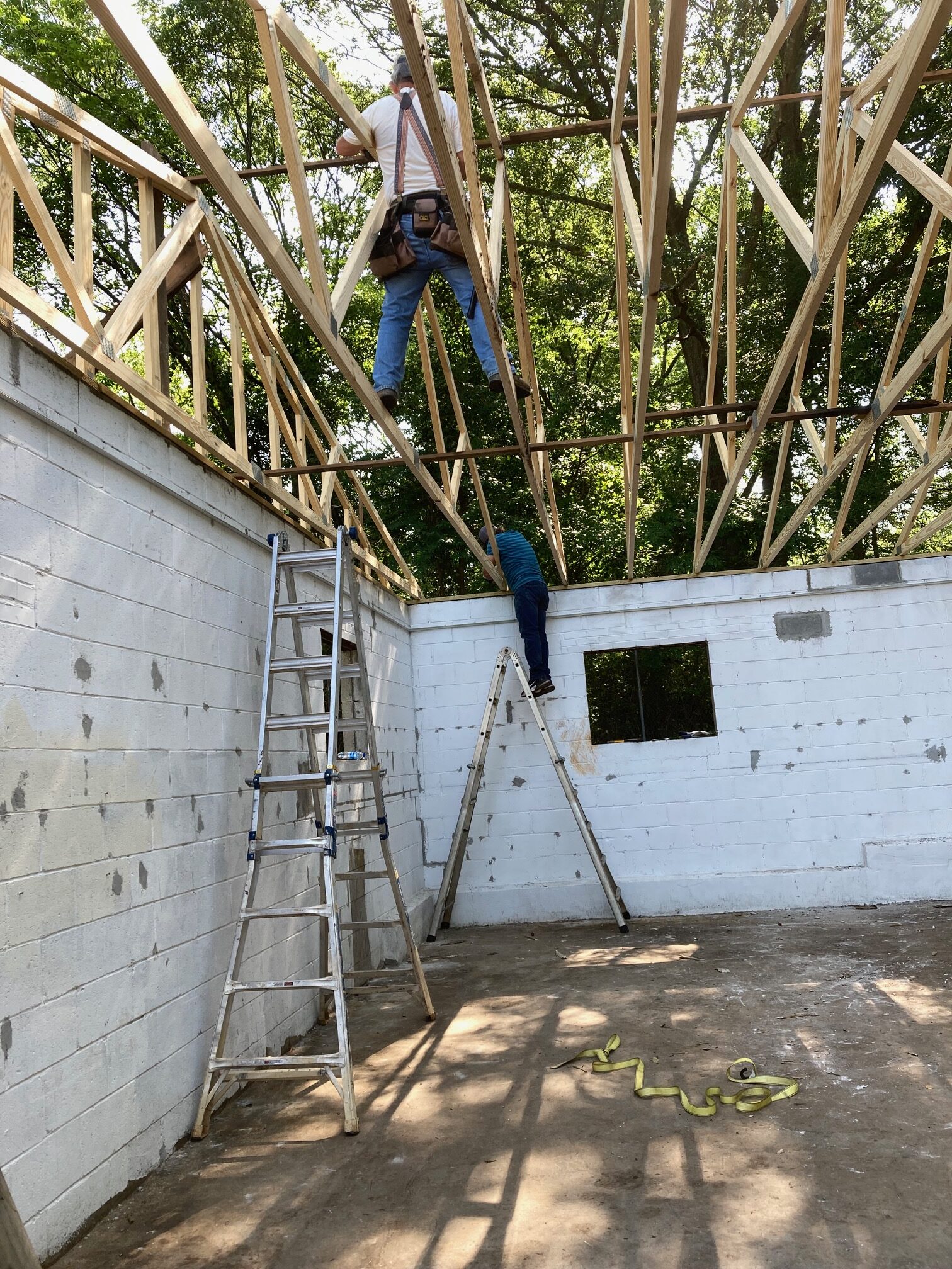 Tim and Shannon help set Trusses